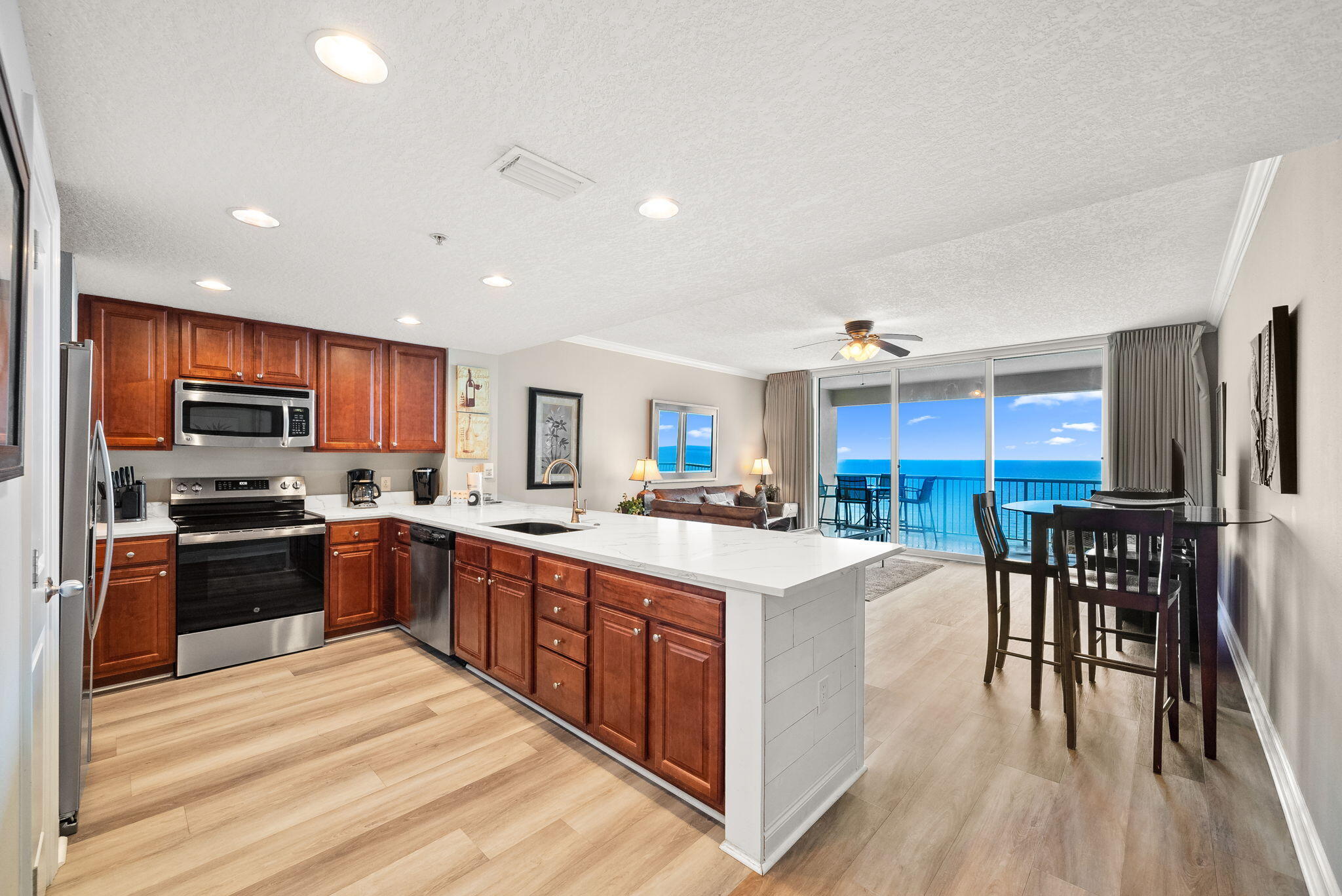 17281 Front Beach Road, Unit 1304 Panama City Beach, FL 32413 - Photo 11 of 36 Kitchen & Living Area