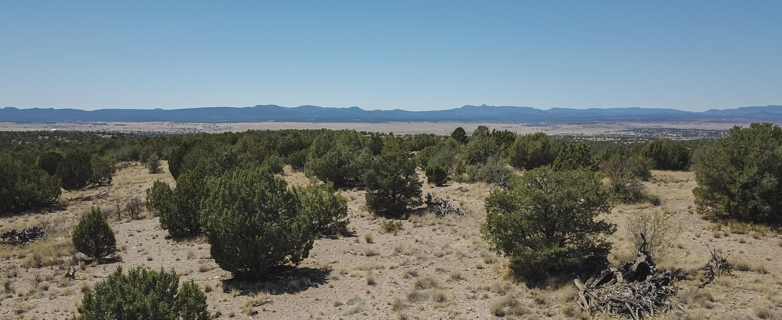 18500 Crossroads Ranch Road Prescott, AZ 86305 - Photo 15 of 21 a view of lake with mountain in background
