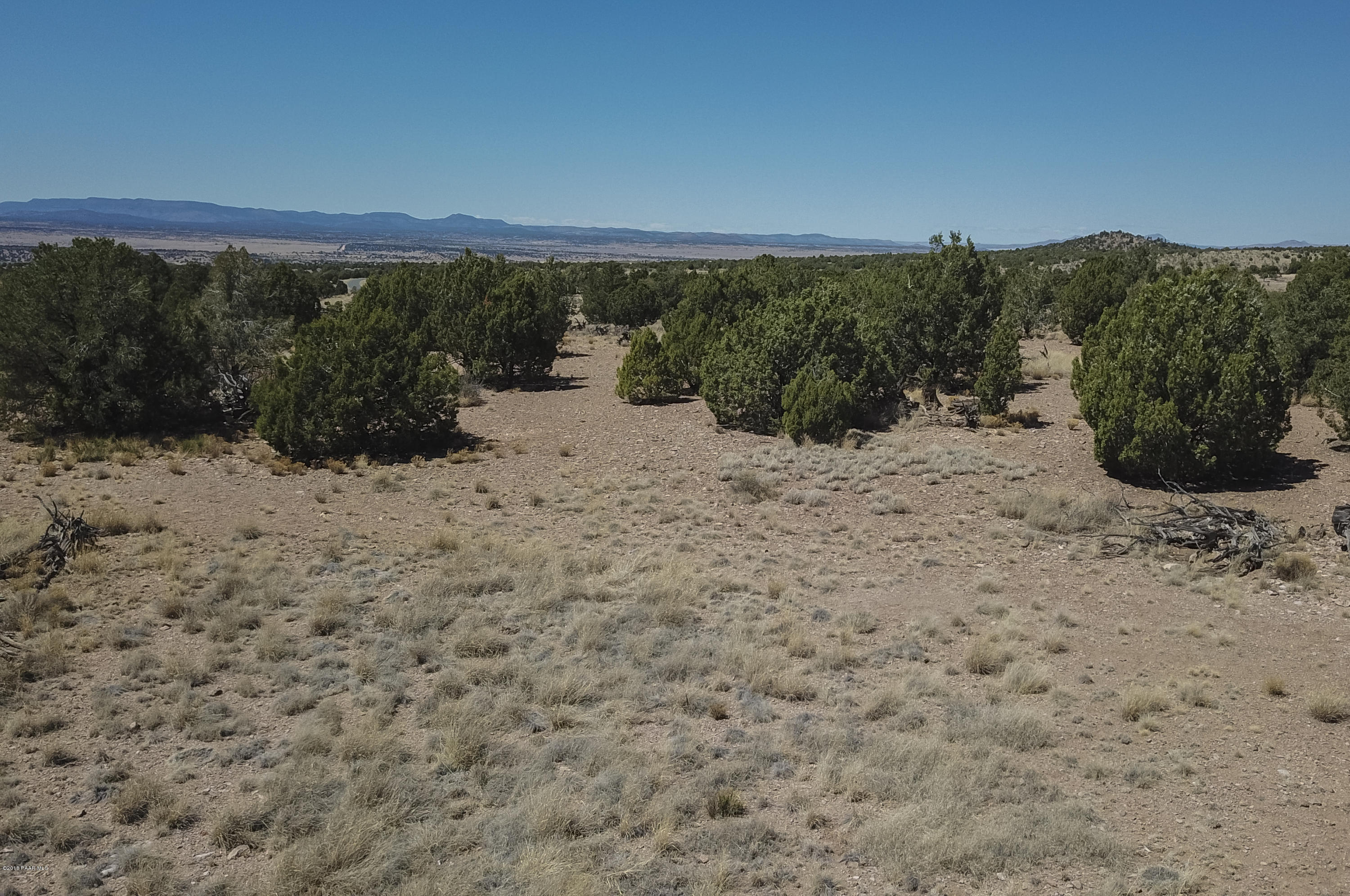 18500 Crossroads Ranch Road Prescott, AZ 86305 - Photo 9 of 21 a view of a lake with a mountain