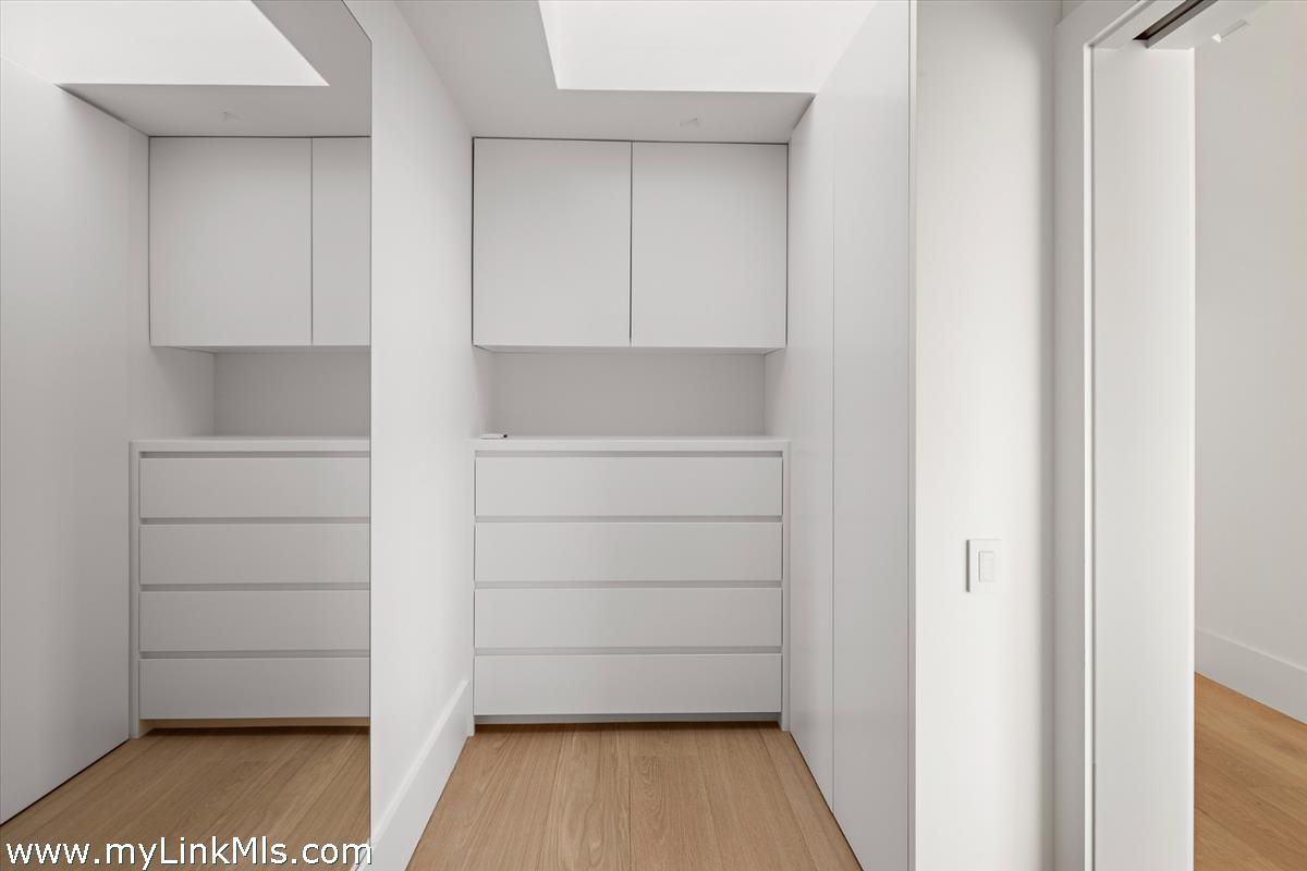 146 Quenames Road Chilmark, MA 02535 - Photo 28 of 77 The Farmhouse Primary Closet