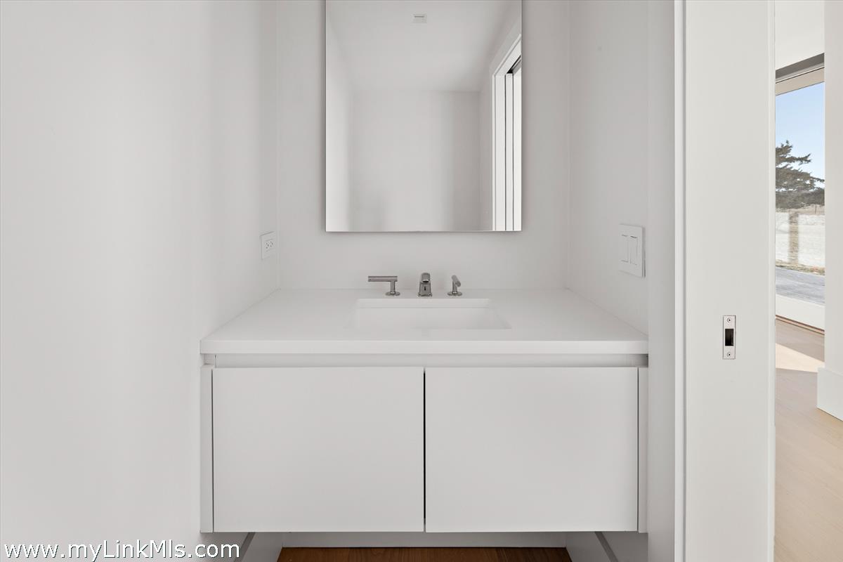 146 Quenames Road Chilmark, MA 02535 - Photo 39 of 77 The Gym Half-Bathroom