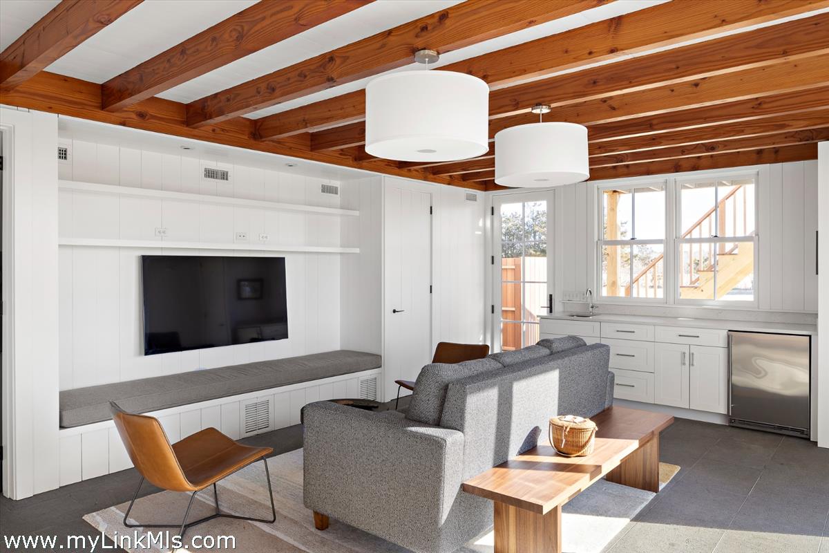 146 Quenames Road Chilmark, MA 02535 - Photo 67 of 77 The Bunk House living room with Wet Bar