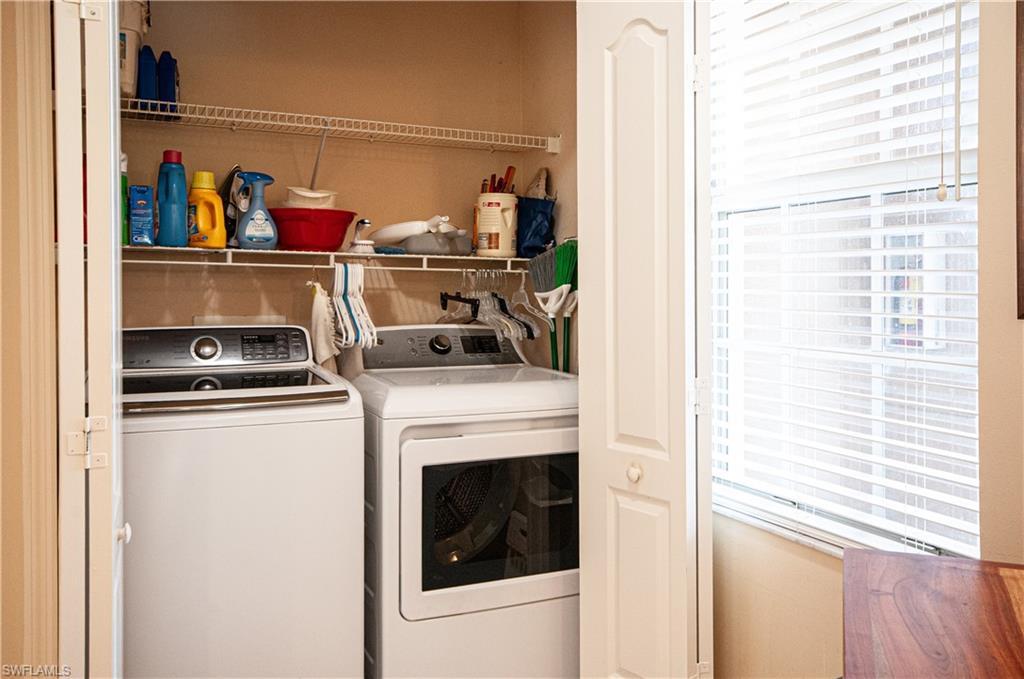 9030 Spring Run Boulevard, Unit 507 Estero, FL 34135 - Photo 21 of 21 a utility room with dryer and washer