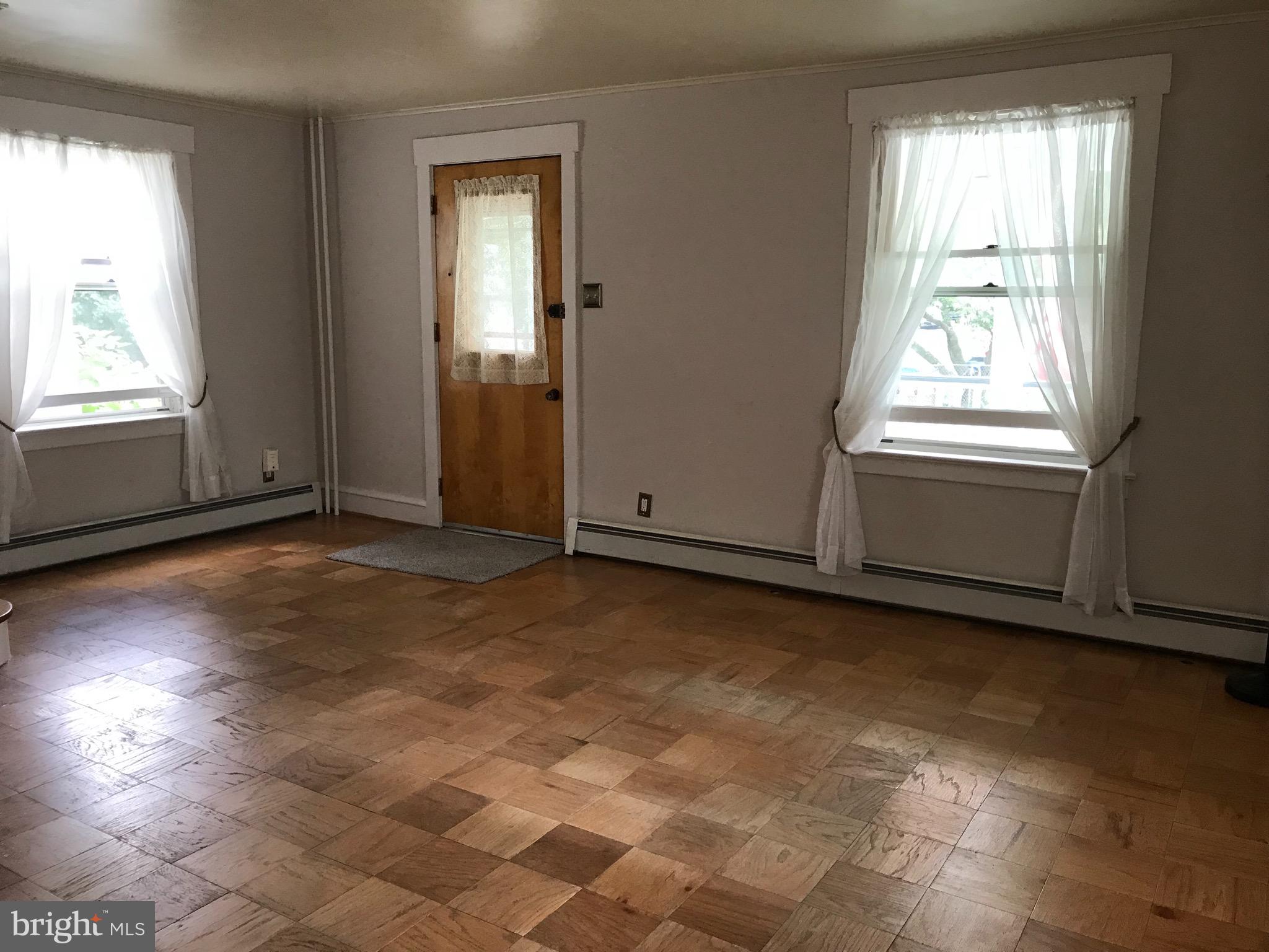 60 Beloit Avenue Audubon, NJ 08106 - Photo 2 of 31 Living Room with Parquet Floors