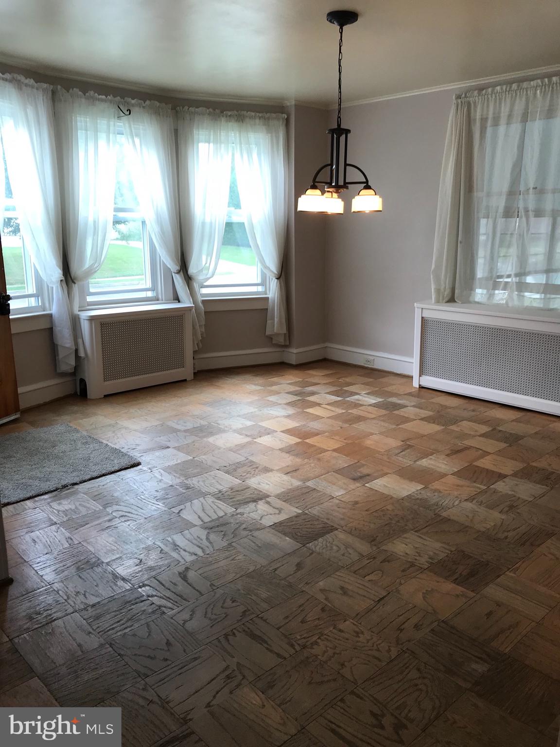 60 Beloit Avenue Audubon, NJ 08106 - Photo 6 of 31 Dining Room with Parquet Floors & Bay Window