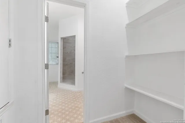 a bathroom with a bathtub and a sink