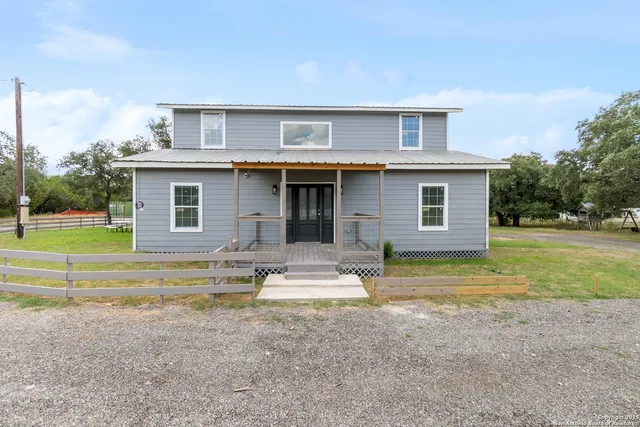 a house view with a outdoor space