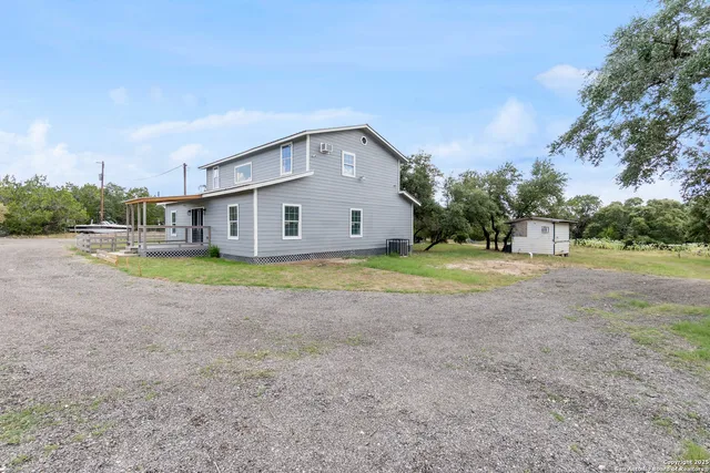 a view of outdoor space with trees all around