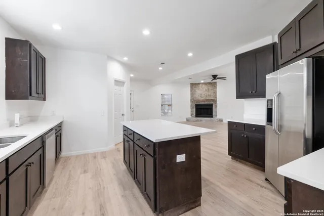 a kitchen with a stove and a microwave