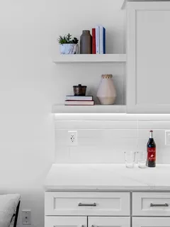 a close view of closet and wooden floor