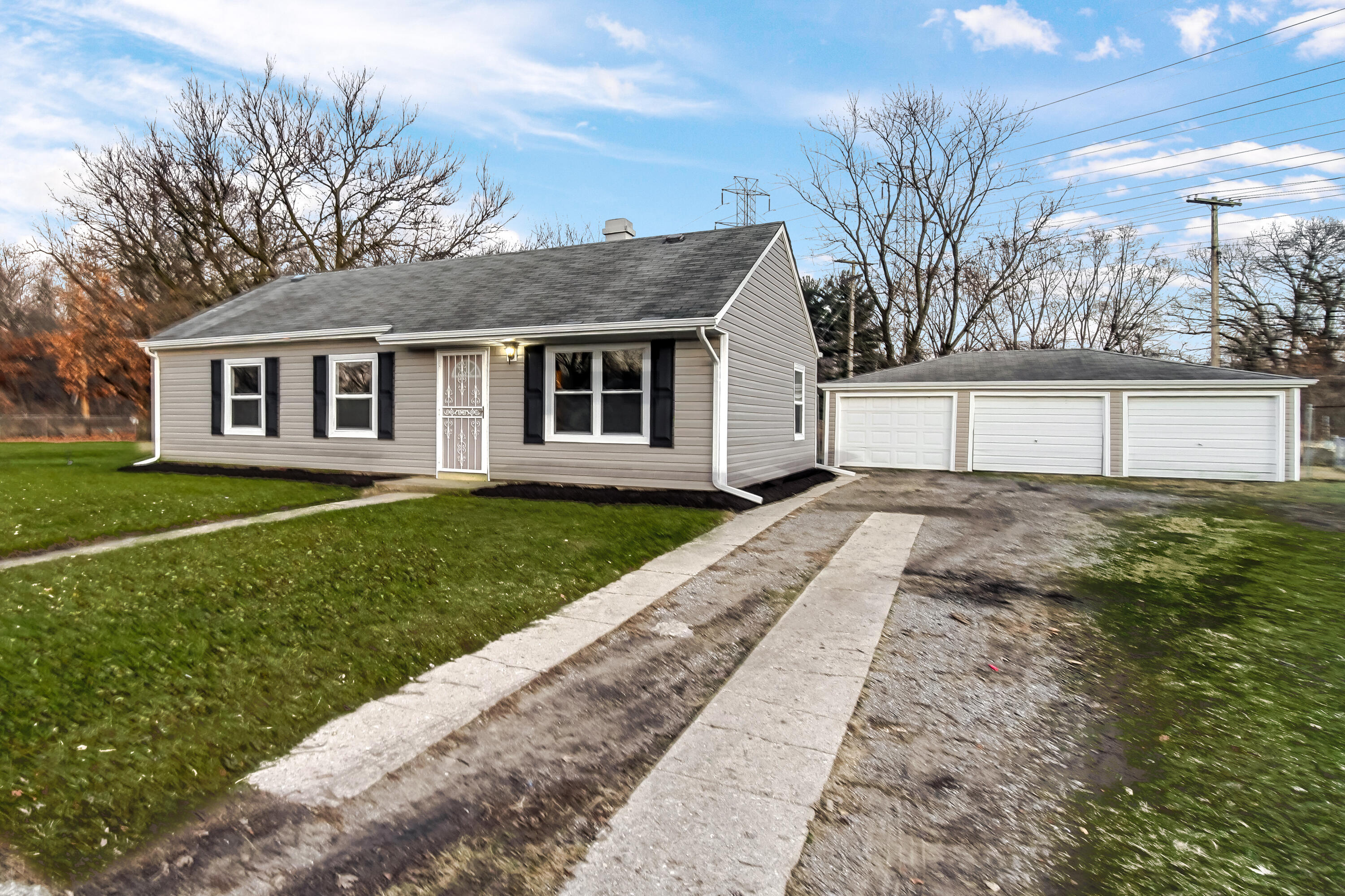 625 South Wells Street Gary, IN 46403 - Photo 1 of 18 a front view of a house with a yard