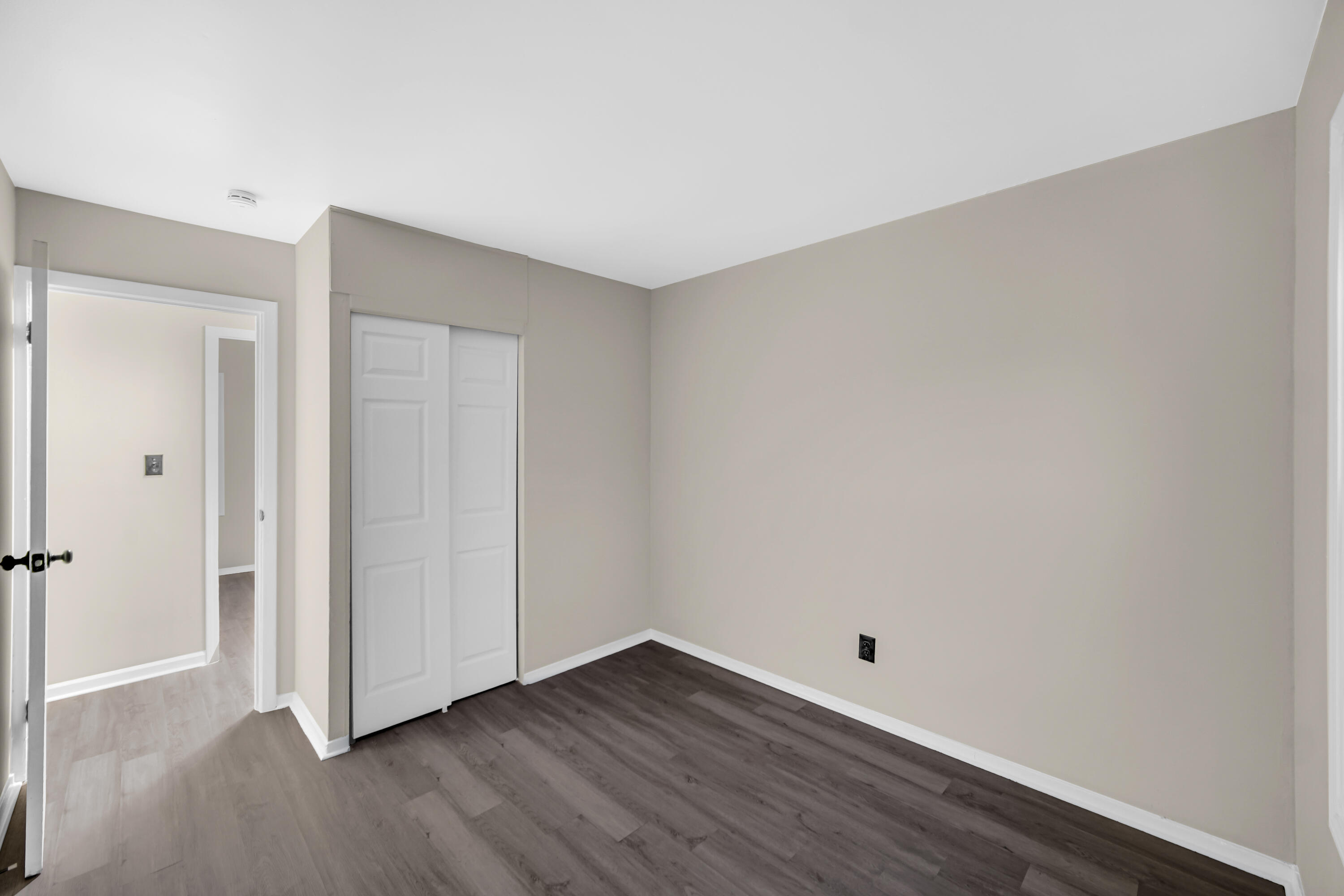 625 South Wells Street Gary, IN 46403 - Photo 13 of 18 a view of an empty room with wooden floor
