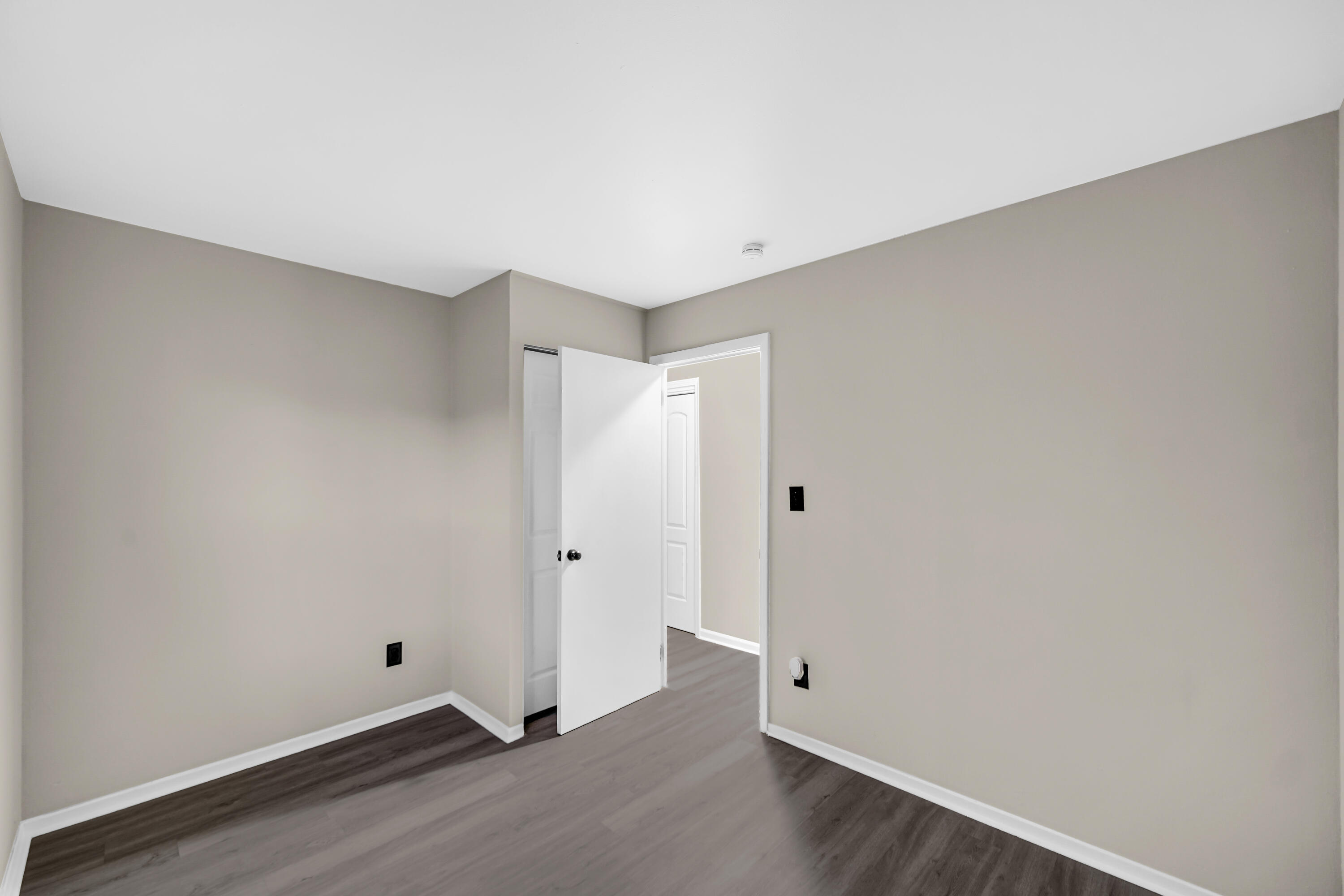 625 South Wells Street Gary, IN 46403 - Photo 14 of 18 an empty room with wooden floor