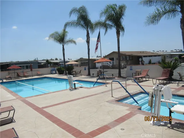 a view of outdoor kitchen with outdoor seating