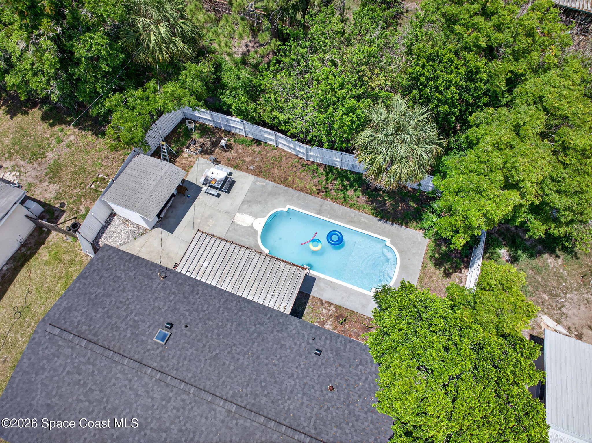 3300 Argyle Road Titusville, FL 32796 - Photo 28 of 29 an aerial view of a house with a yard