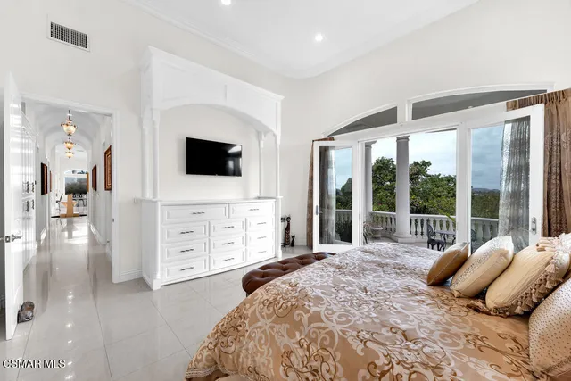 a view of a wrought iron fences in front of house