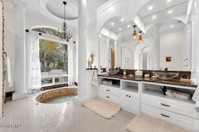 an aerial view of a houses with yard