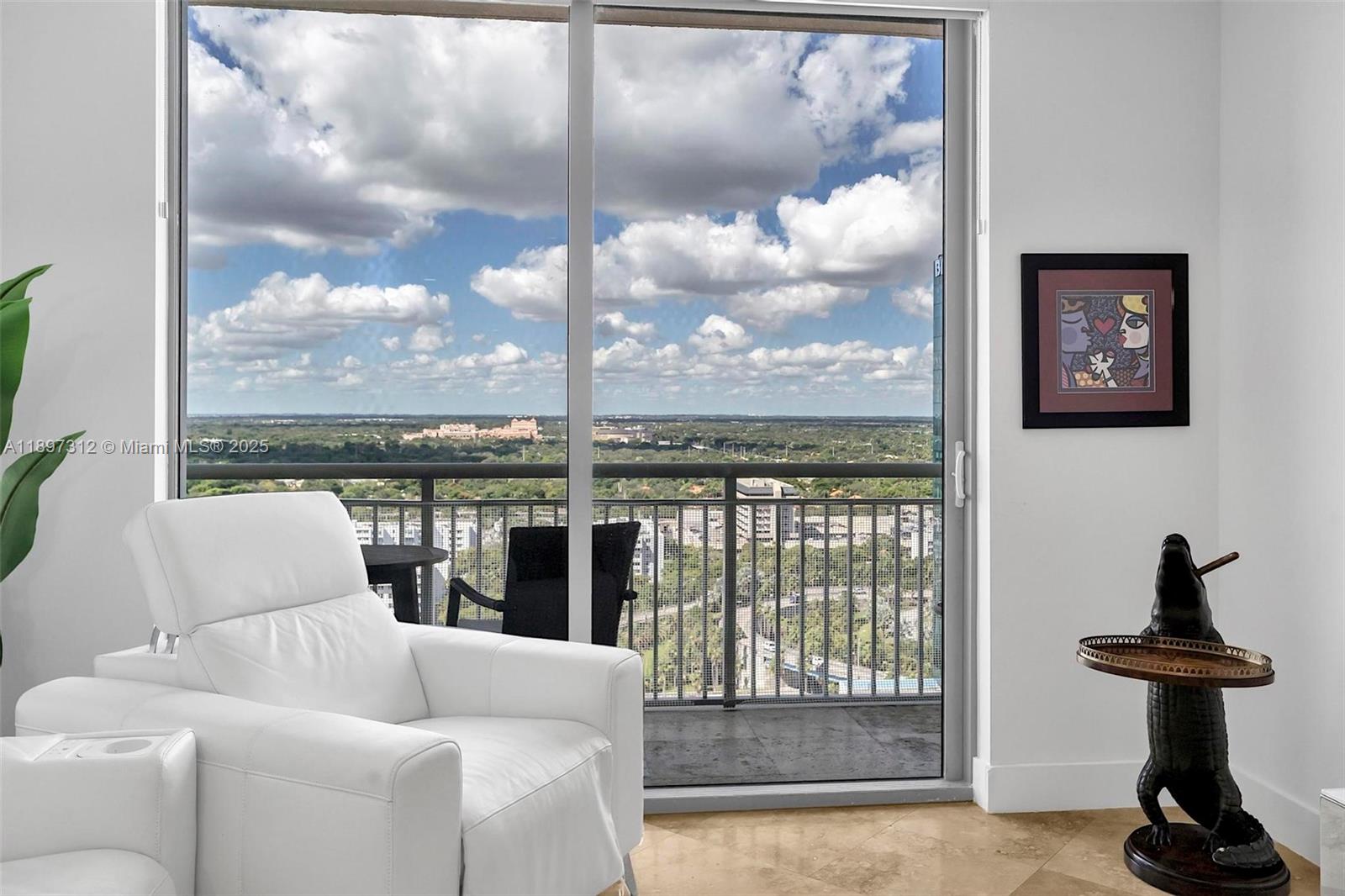 9066 Southwest 73rd Court, Unit 2110 Miami, FL 33156 - Photo 14 of 45 a living room with furniture