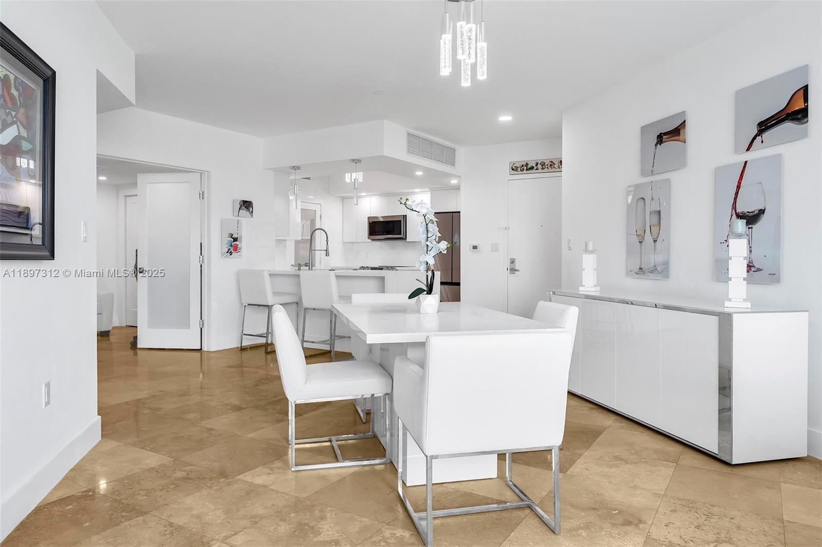 9066 Southwest 73rd Court, Unit 2110 Miami, FL 33156 - Photo 21 of 45 a view of kitchen with furniture and wooden floor