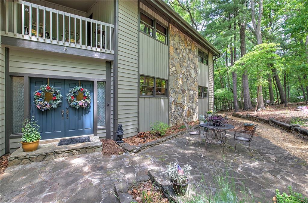 12 Tamarack Point Jasper, GA 30143 - Photo 15 of 83 a backyard of a house with outdoor seating