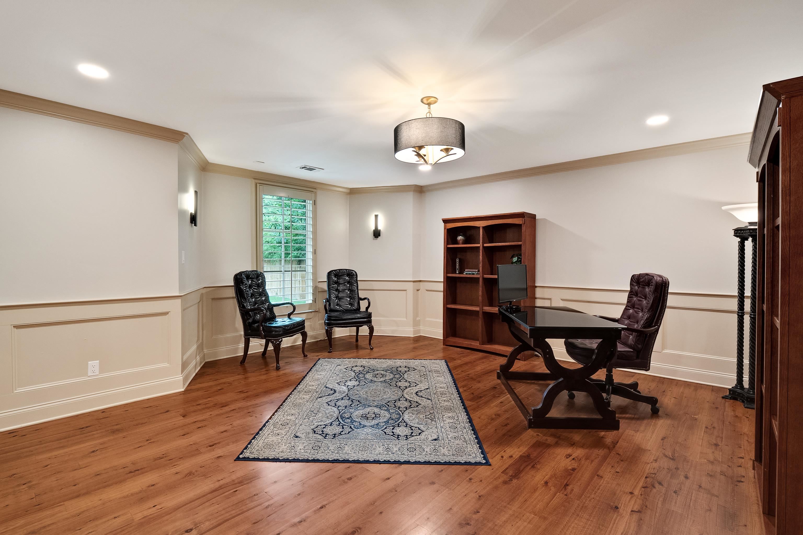 5720 Shady Grove Road Memphis, TN 38120 - Photo 16 of 40 a view of a dining room with furniture and wooden floor