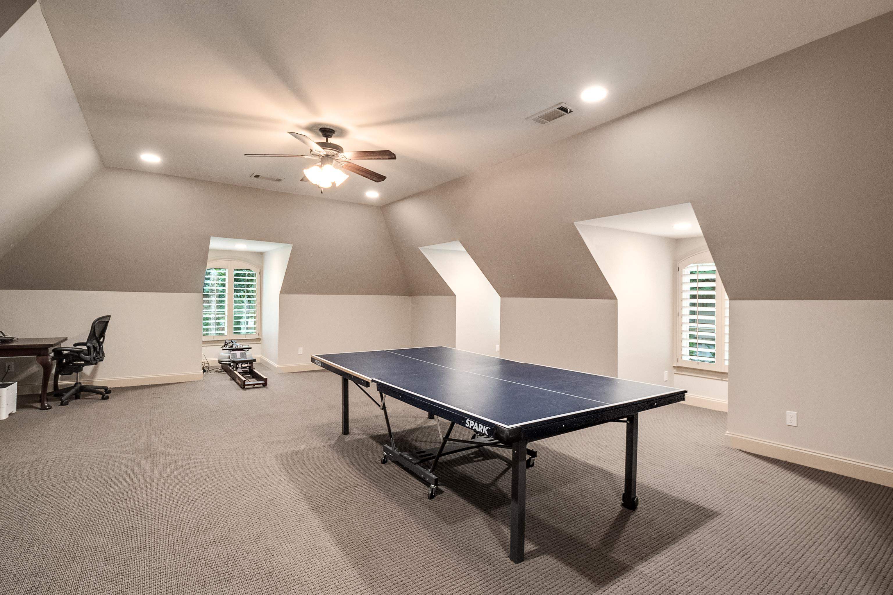 5720 Shady Grove Road Memphis, TN 38120 - Photo 29 of 40 a workspace with furniture and a chandelier
