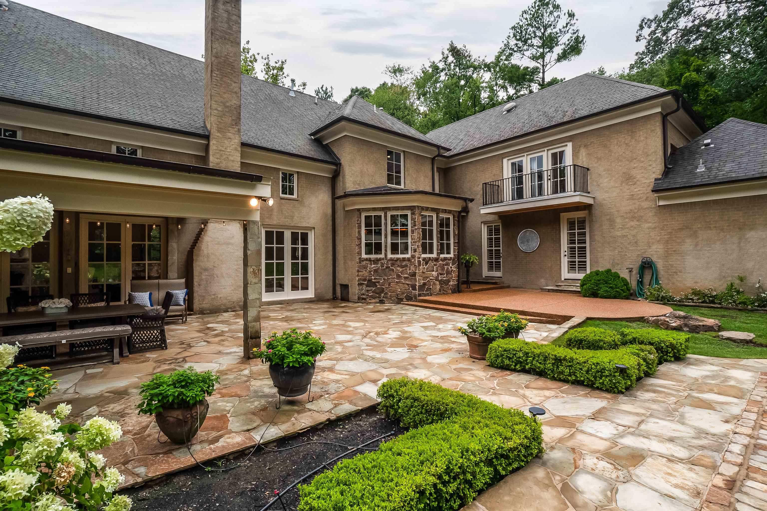 5720 Shady Grove Road Memphis, TN 38120 - Photo 34 of 40 a front view of a house with garden
