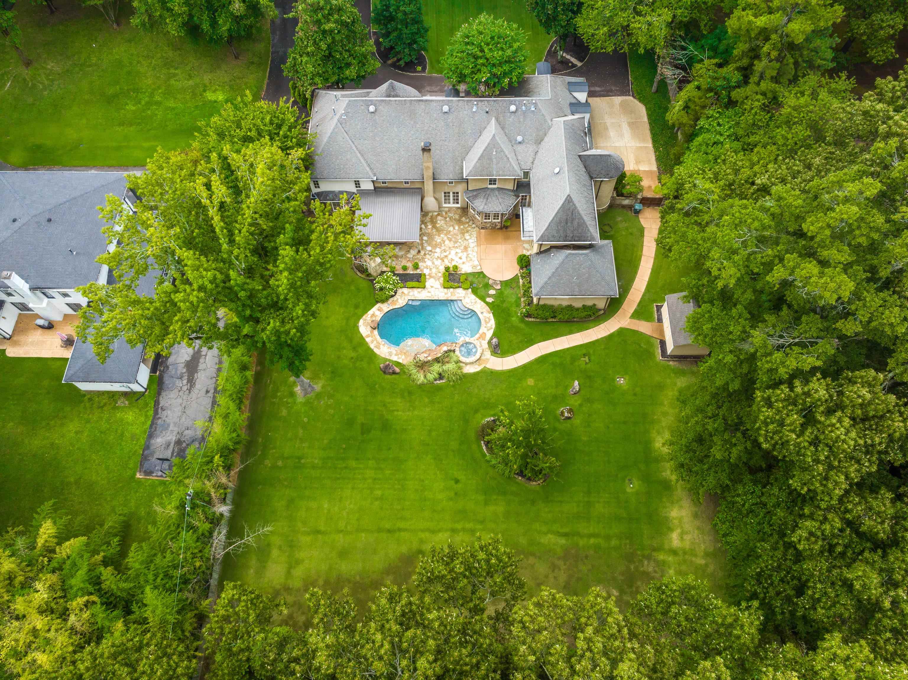 5720 Shady Grove Road Memphis, TN 38120 - Photo 40 of 40 an aerial view of residential house with an outdoor space and seating