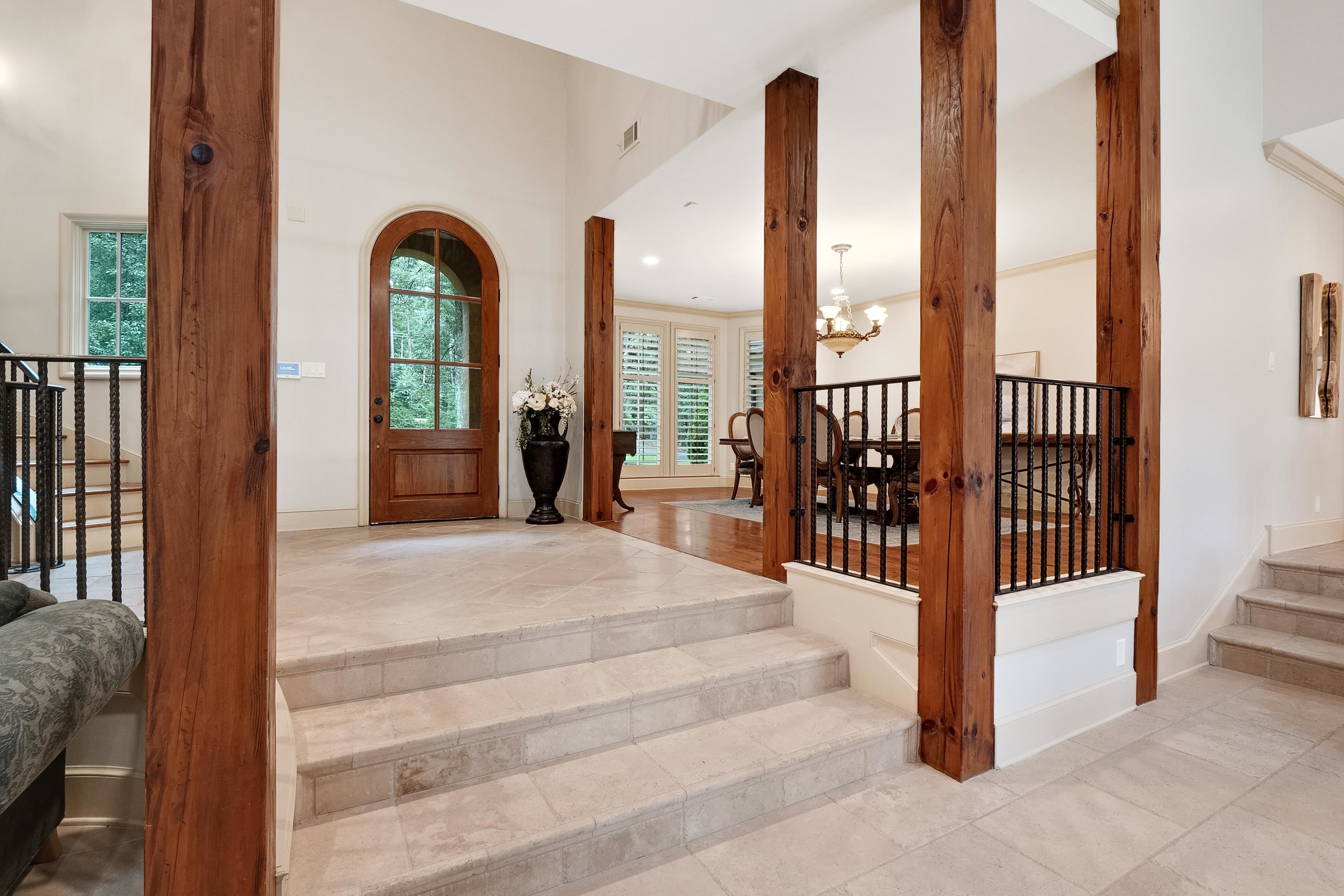 5720 Shady Grove Road Memphis, TN 38120 - Photo 4 of 40 a view of staircase with two large windows