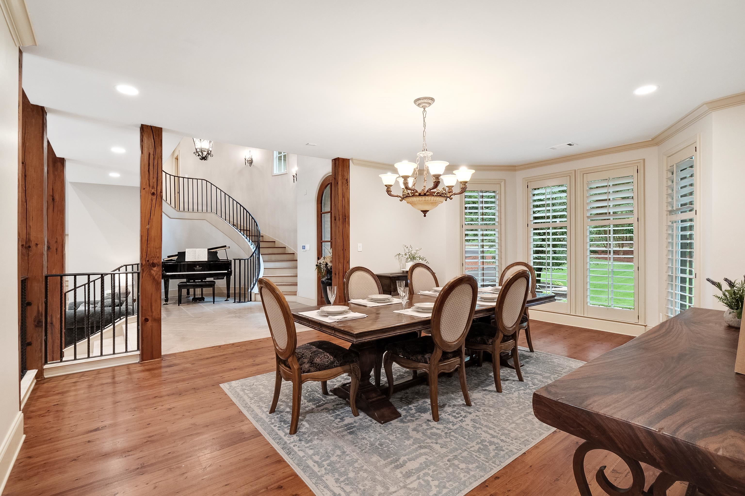 5720 Shady Grove Road Memphis, TN 38120 - Photo 7 of 40 a view of a dining room with furniture window and wooden floor