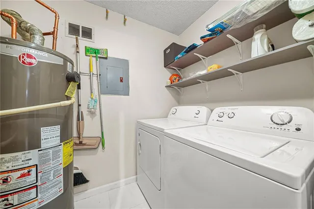 a balcony with wooden floor and outdoor seating