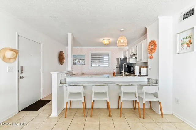 $380,000 | 1822 New River Inlet Road, Unit 1305A, North Topsail Beach, NC 28460