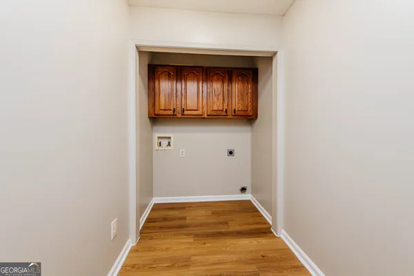 a view of hallway with granite countertop