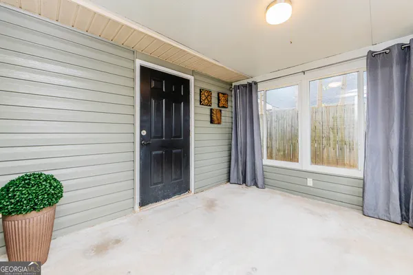 a view of front door and porch