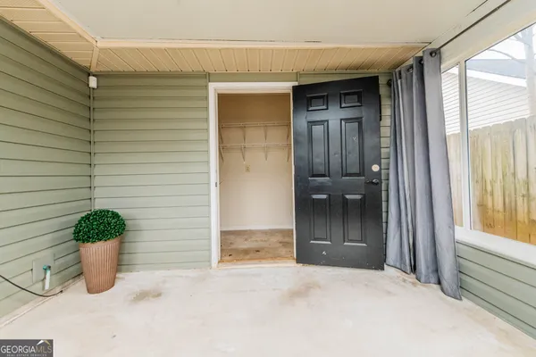 a view of a door and a outdoor space