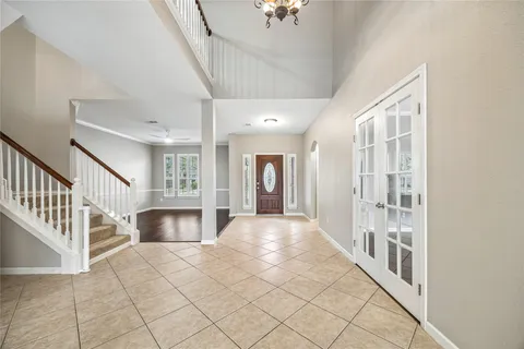 a view of a hallway with staircase