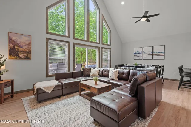 a bedroom with a bed and a lamp