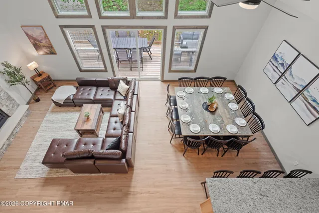 a view of a patio with a table and chairs