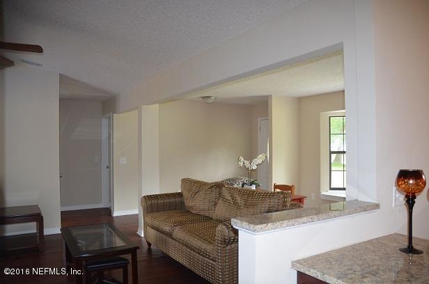 10982 Reading Road Jacksonville, FL 32257 - Photo 13 of 27 a living room with furniture and a window