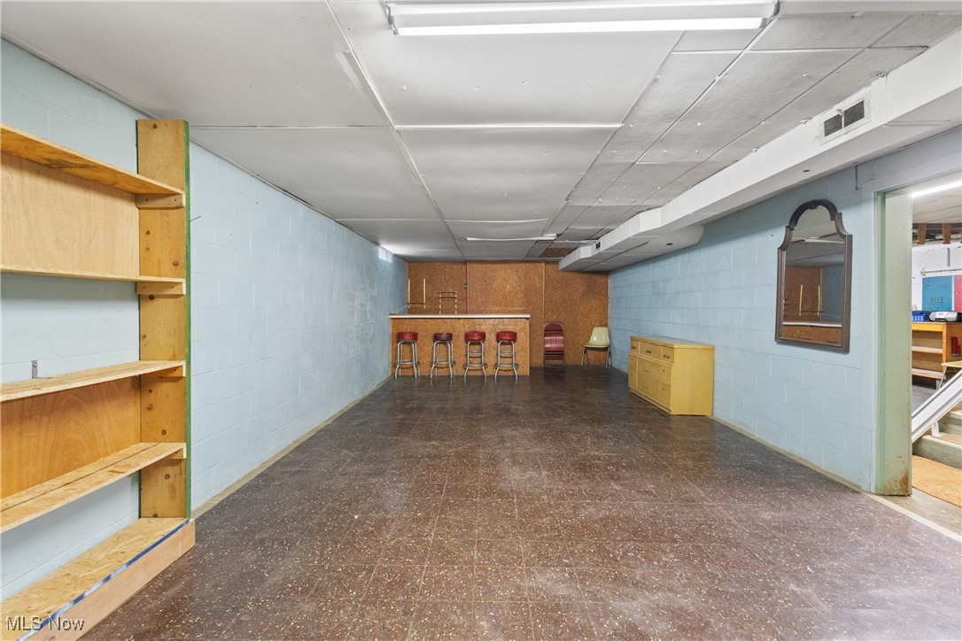 4937 Stevens Road Akron, OH 44319 - Photo 25 of 40 Lower level has huge rec room with bar