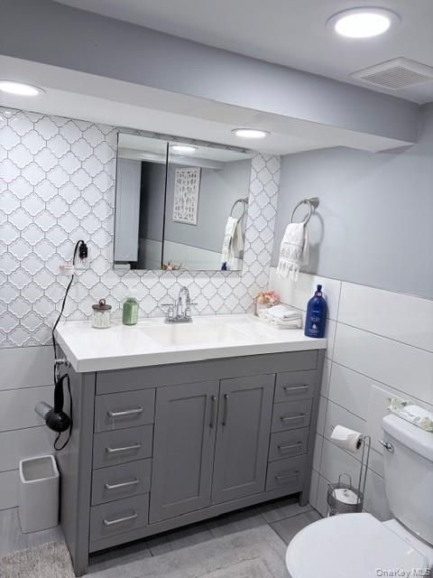 78-18 65th Street Queens, NY 11385 - Photo 17 of 25 a bathroom with a sink and a toilet