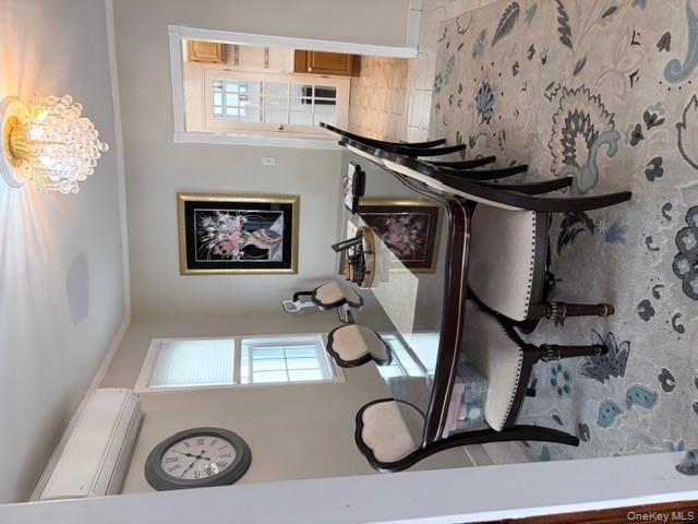 78-18 65th Street Queens, NY 11385 - Photo 4 of 25 a dining room with furniture and window