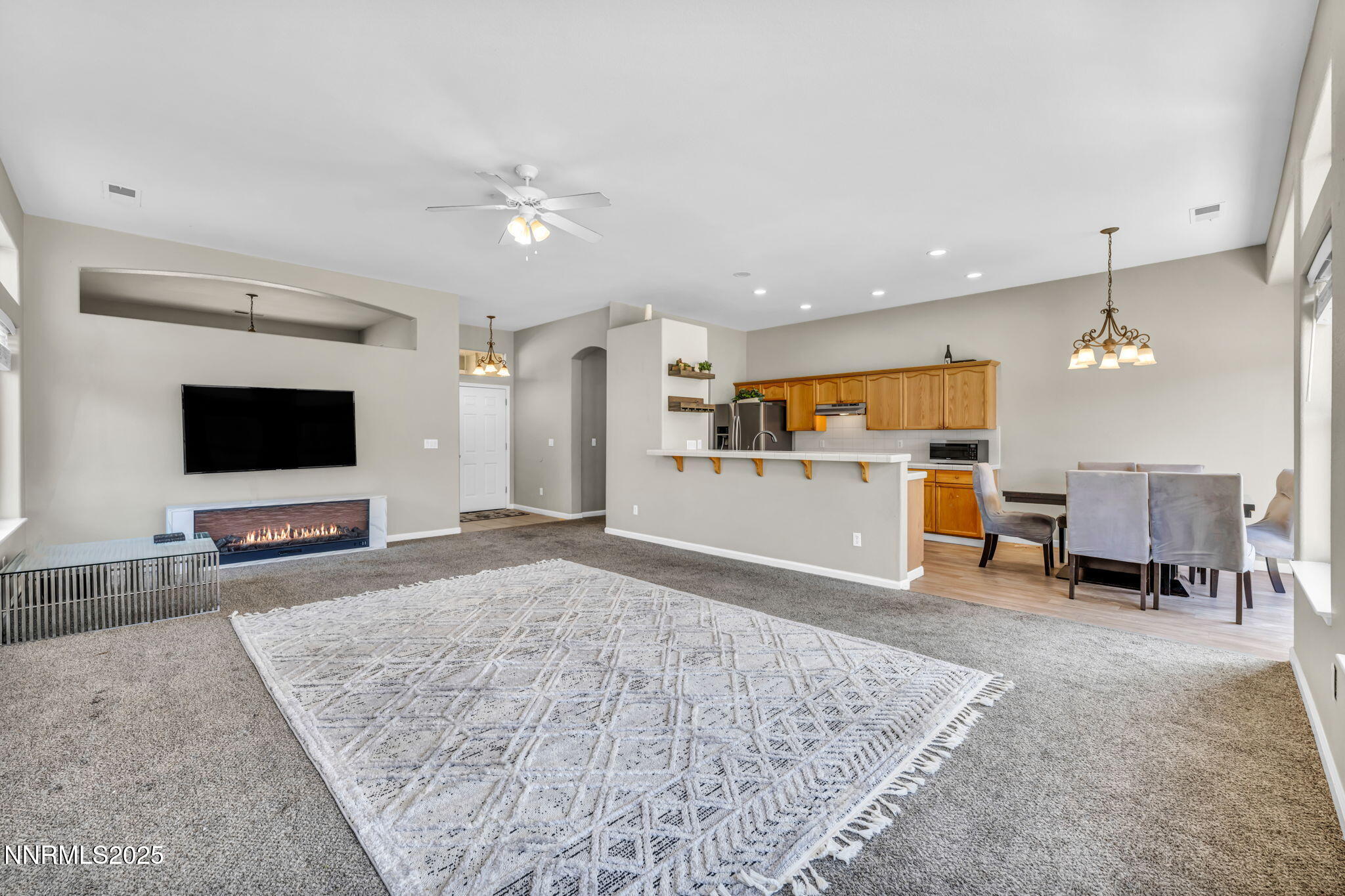 908 Jones Way Fernley, NV 89408 - Photo 2 of 17 a view of kitchen with sink microwave and refrigerator