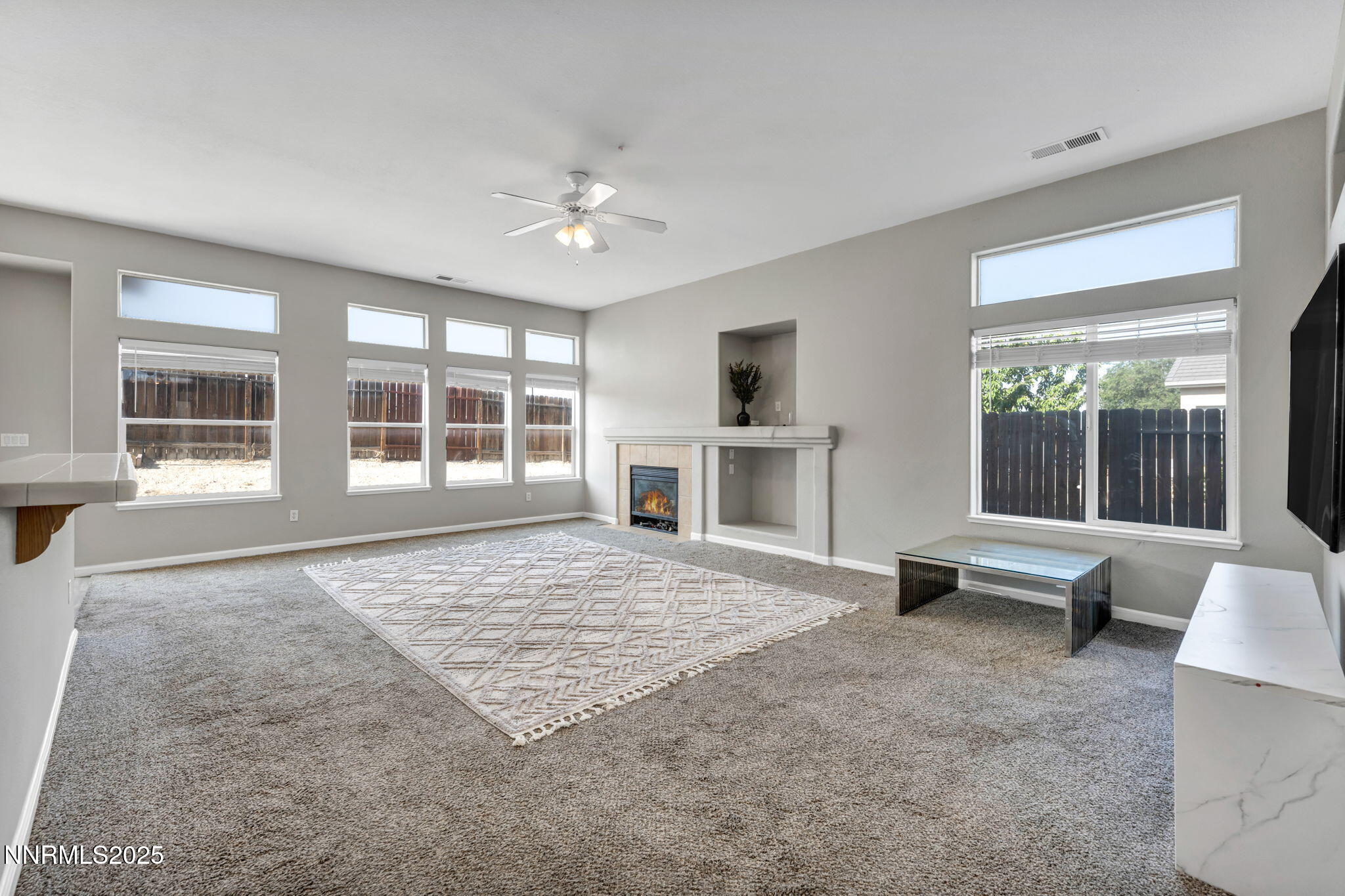 908 Jones Way Fernley, NV 89408 - Photo 3 of 17 a living room with furniture and a window
