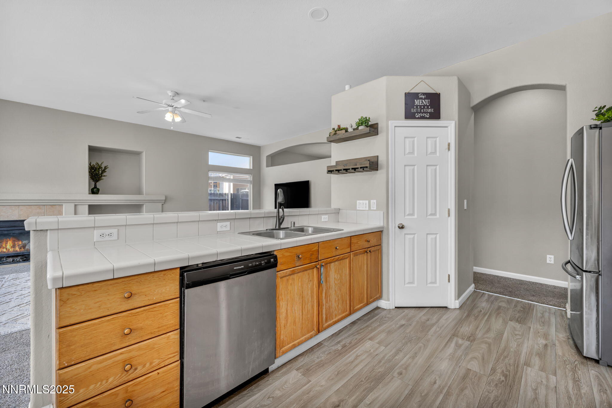 908 Jones Way Fernley, NV 89408 - Photo 5 of 17 a spacious bathroom with a granite countertop sink mirror and shower