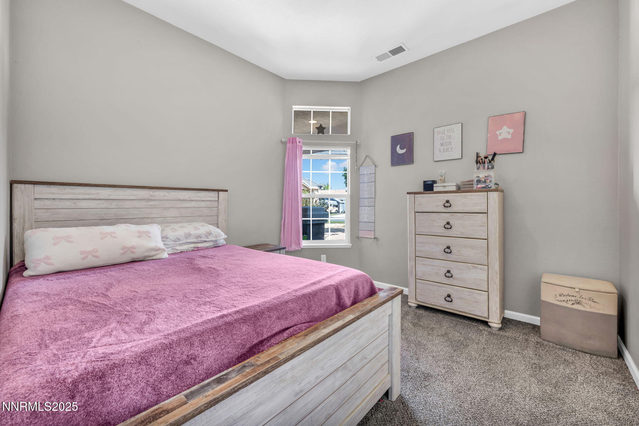 908 Jones Way Fernley, NV 89408 - Photo 6 of 17 a bedroom with a bed and a dresser