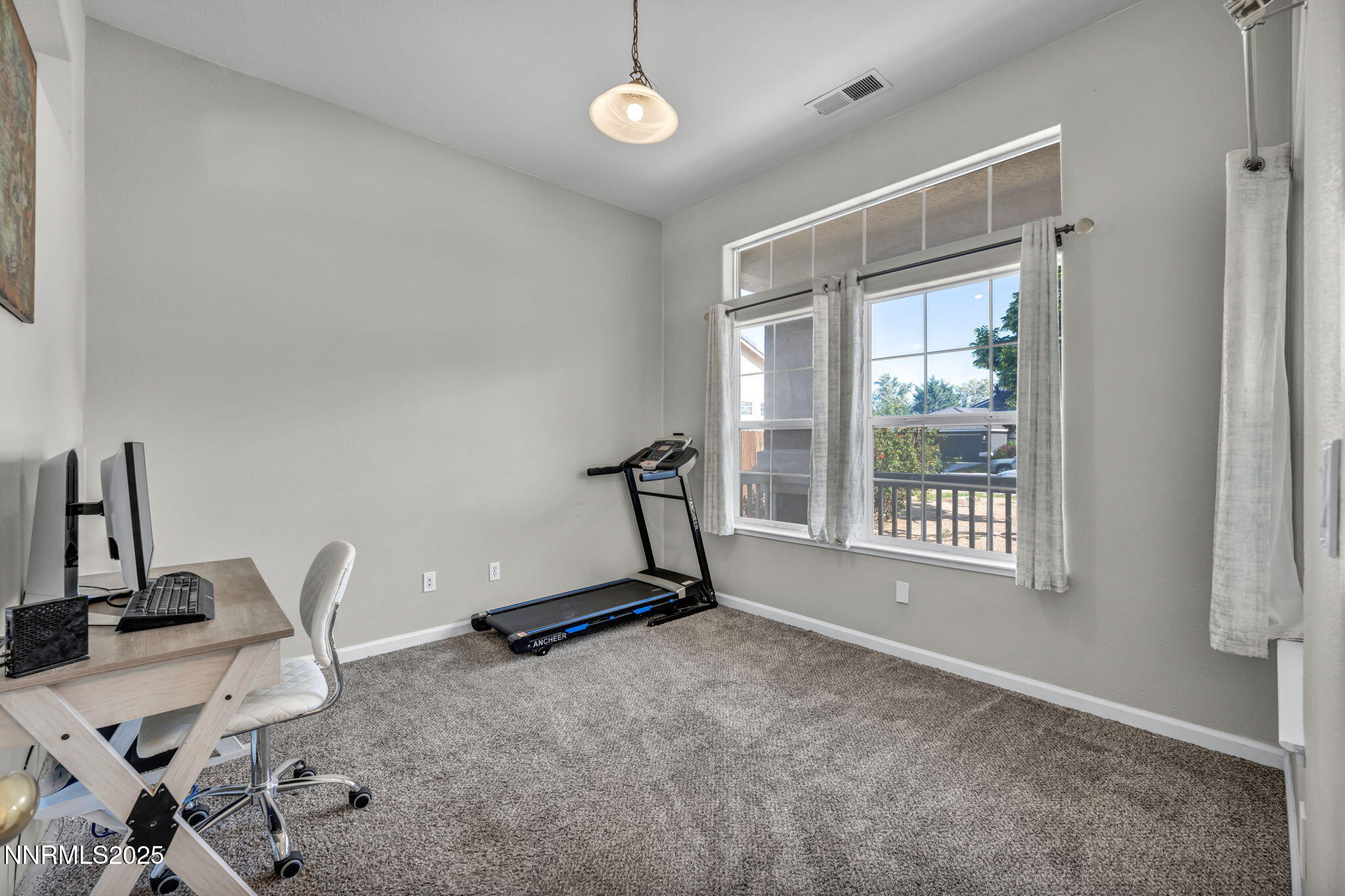 908 Jones Way Fernley, NV 89408 - Photo 8 of 17 a view of a room with gym equipment
