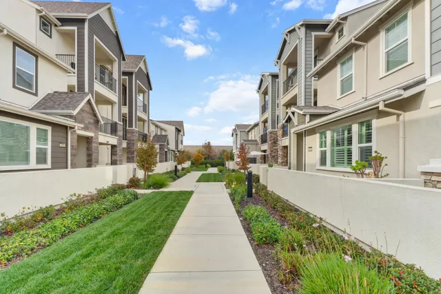 a view of a building with a yard