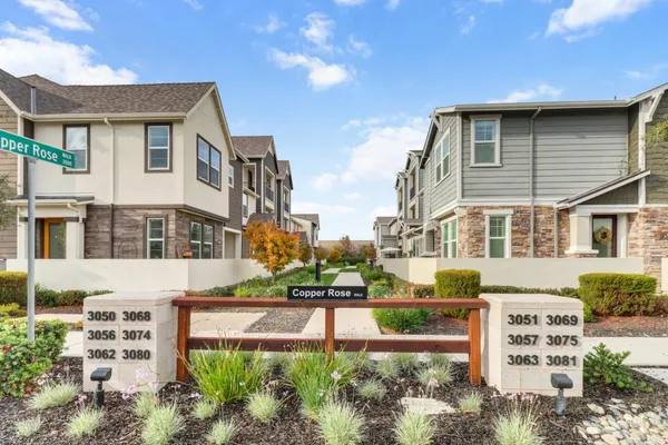 a front view of a building with street view