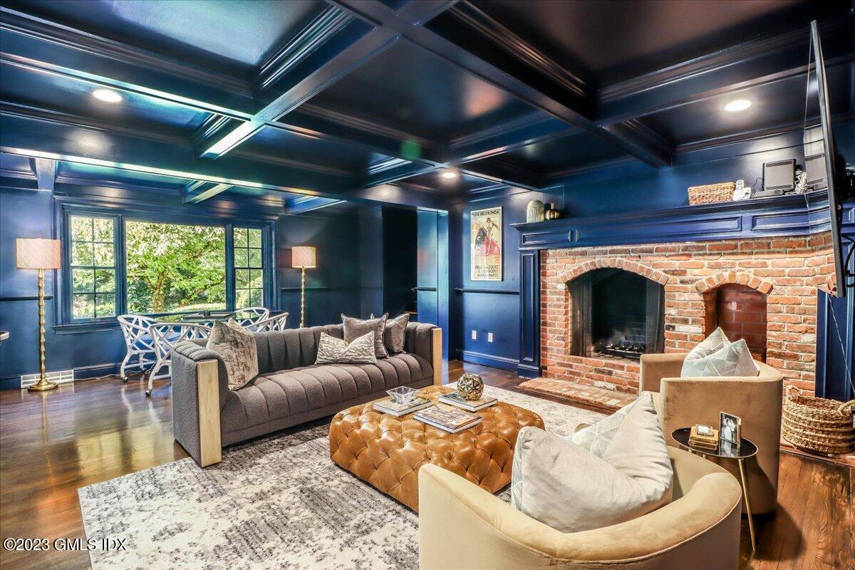 62 North Old Stone Bridge Road Cos Cob, CT 06807 - Photo 11 of 32 a living room with furniture and a fireplace